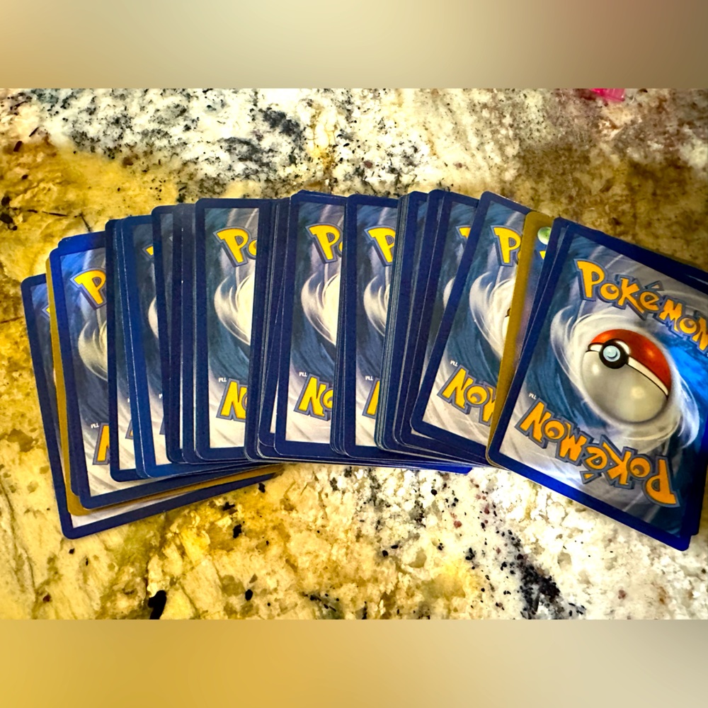 Pokemon card set 50 cards + 5 holos guaranteed